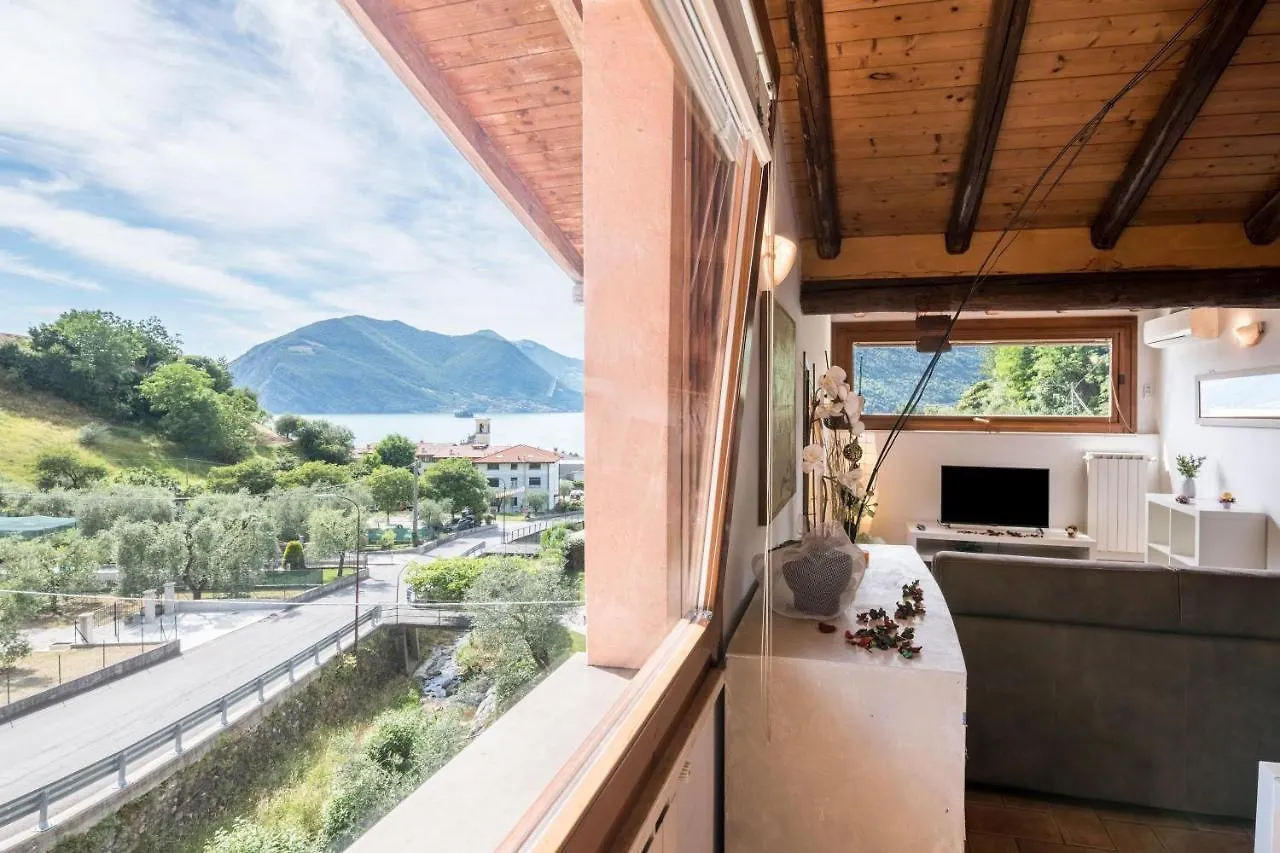 Апартаменты Mansarda Con Vista Lago Сульцано Италия